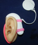 Dispositif de sécurité qui maintient l’aide auditive 
