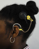 Pince cheveux de maintien aide auditive ou processeur d’implant