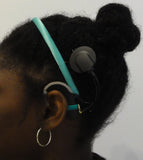Serre tête pour aide auditive ou processeur d’implant
