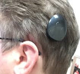 Pince cheveux de maintien pour aide auditive ou processeur d’implant